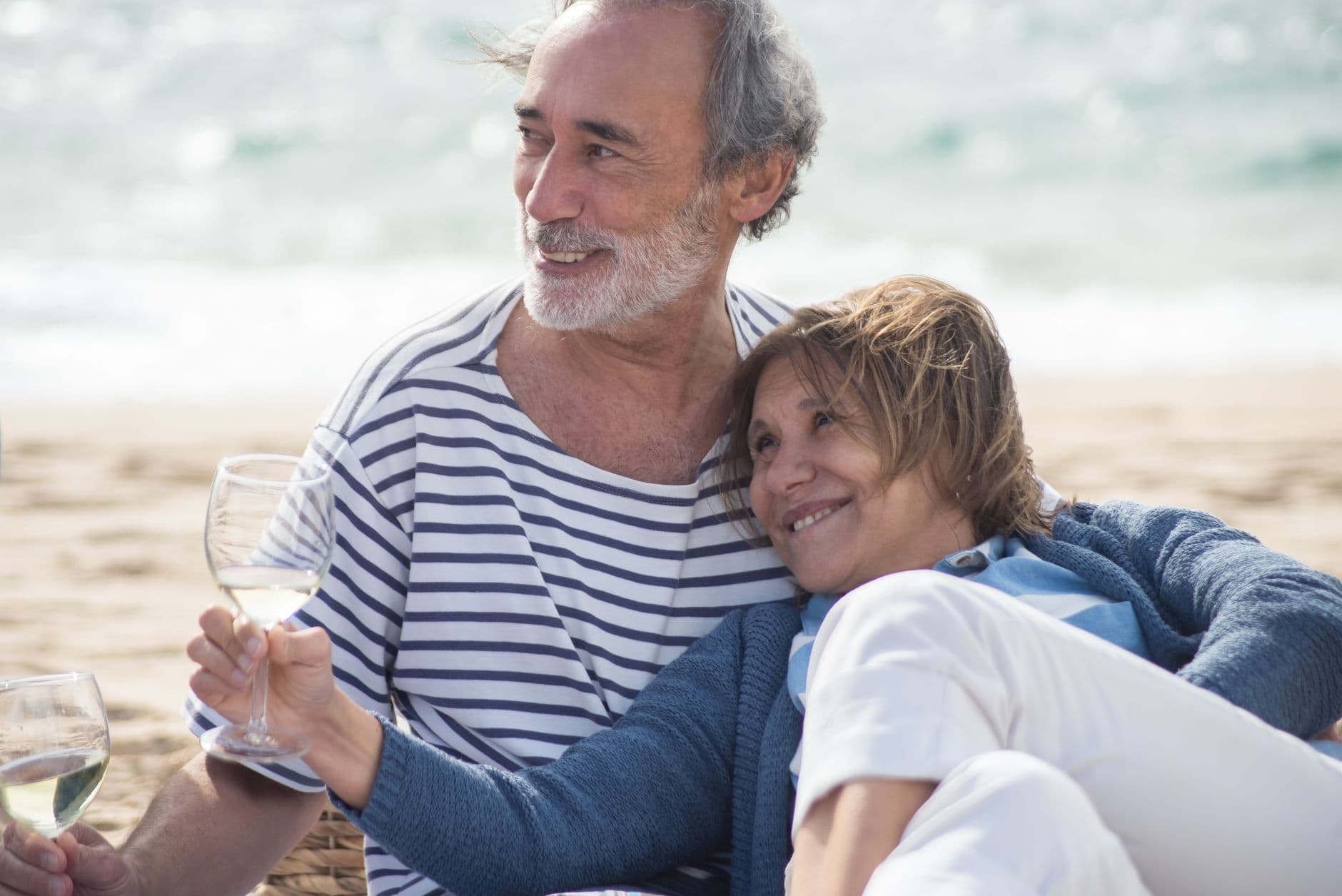 Elegant couple on a coastal terrace